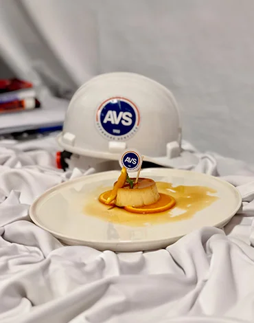 AVS helmet behind a great looking dessert