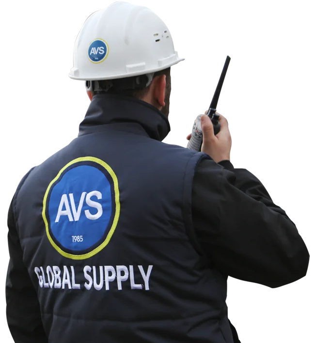 An AVS employee managing ship supply by radio